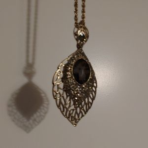 Bejeweled peacock feather necklace